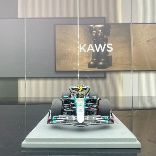 Spark 1/18 Mercedes-AMG W15 UK Grand Prix Victory No. 44 Hamilton Sitting and Holding the Flag Version