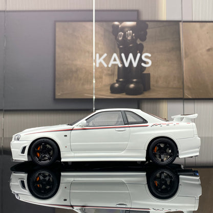 MOTORHELIX 1/18 NISMO SKYLINE GT-R (R34) Modelo de coche de simulación totalmente abierto de aleación PERSONALIZADO POR NISMO