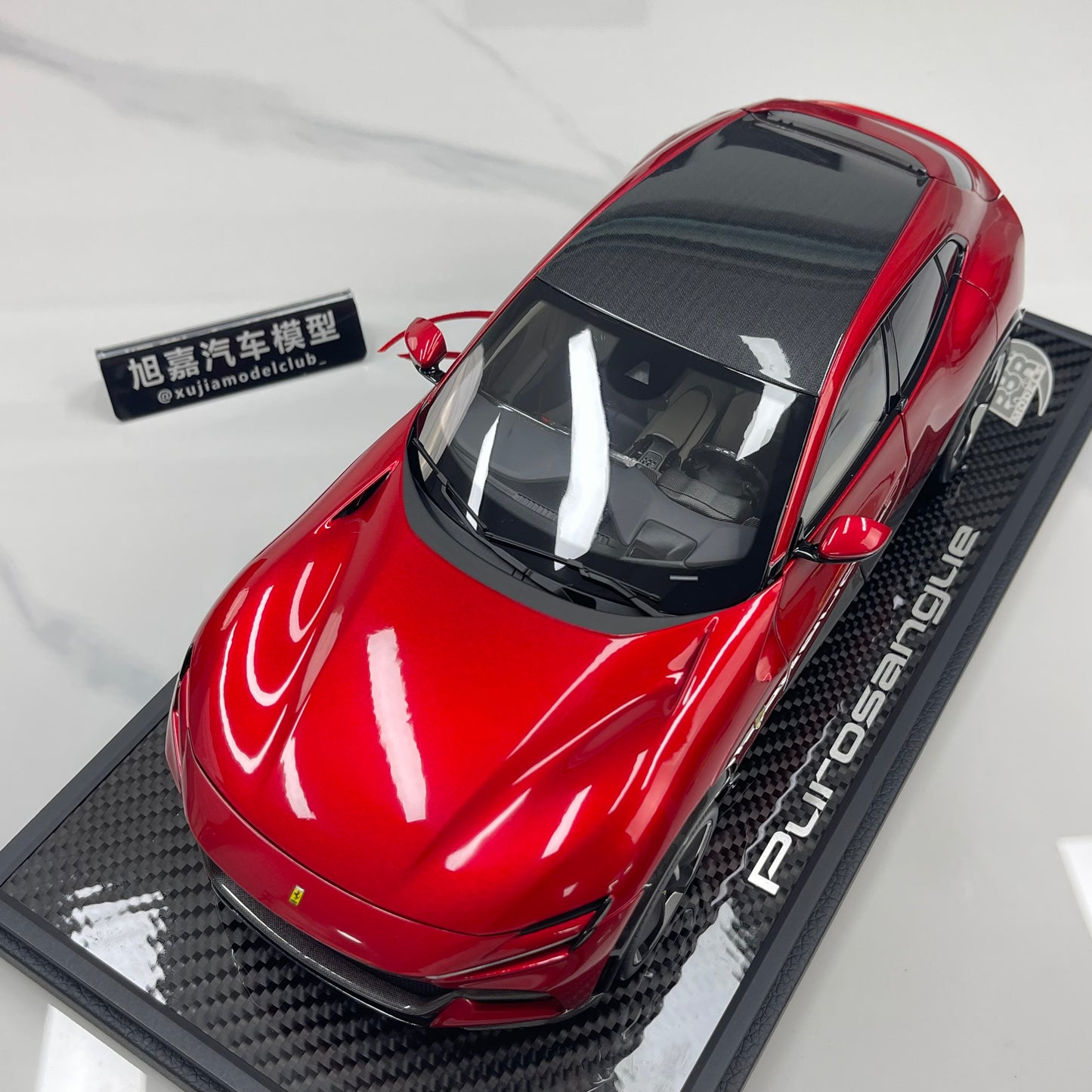BBR 1/18 Ferrari Pursangue, black top, carbon fiber base metallic red HE180052BCH
