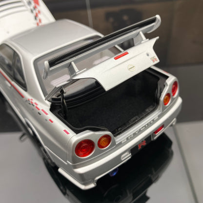 MOTORHELIX 1/18 NISMO SKYLINE GT-R (R34) Modelo de coche de simulación totalmente abierto de aleación PERSONALIZADO POR NISMO
