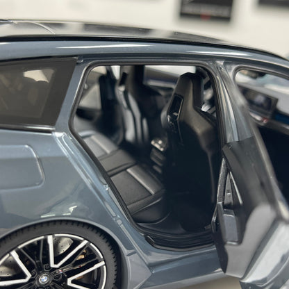 MINICHAMPS 1/18 BMW M5 Touring (2024) – Metallic Grey (110023901)