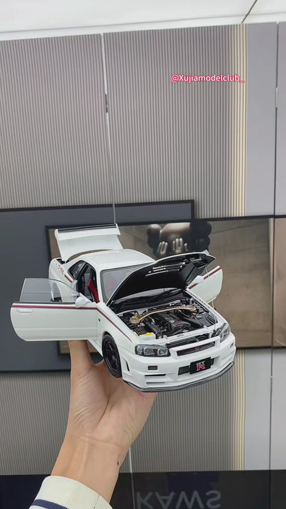 MOTORHELIX 1/18 NISMO SKYLINE GT-R (R34) Modelo de coche de simulación totalmente abierto de aleación PERSONALIZADO POR NISMO